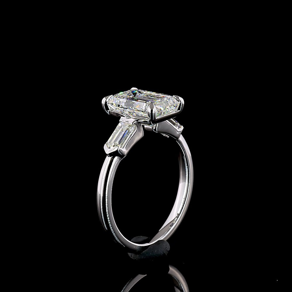 14K White Gold Three Stone Ring with 3.16 Carat Emerald Cut Lab Diamond and Baguette Side Stones - 3.77 Carat Total Diamond Weight - Covaloro Fine Jewelry