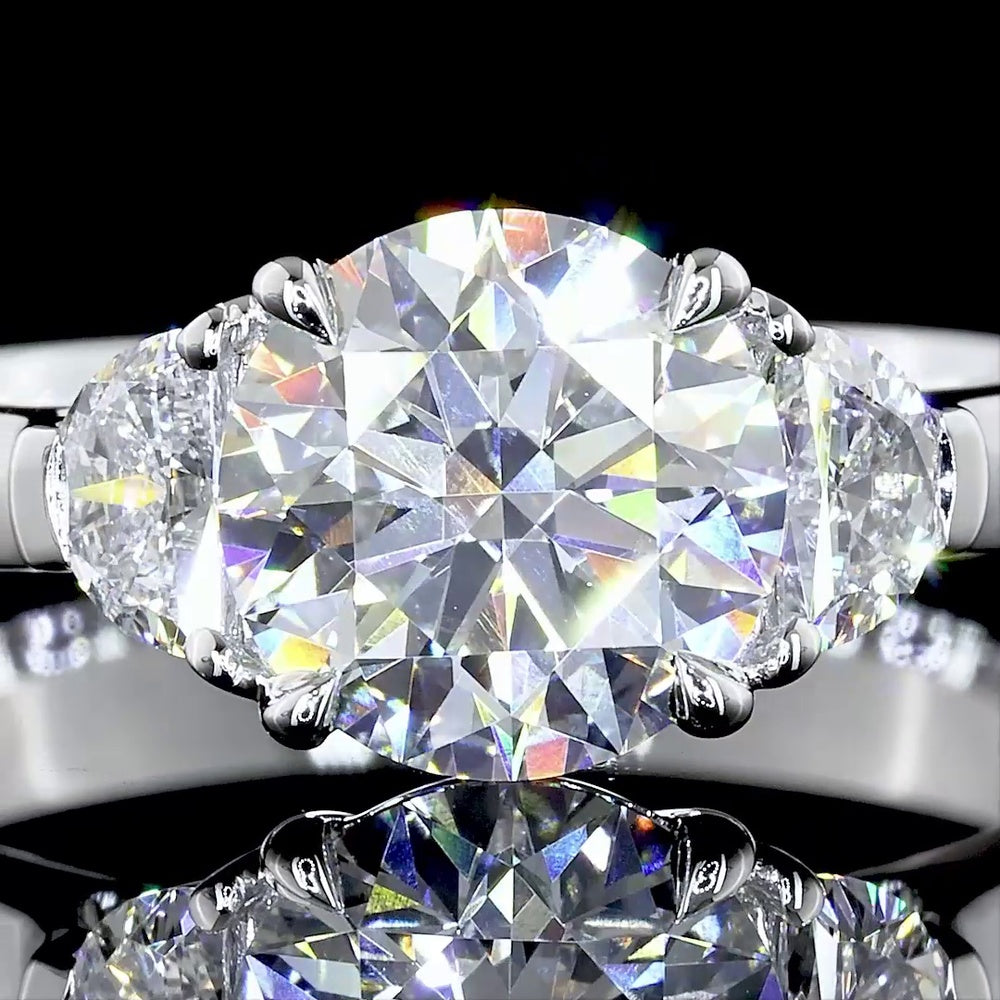 14K White Gold Three Stone Ring with 4.21 Carat Round Brilliant Cut Lab Diamond and 1.03 Carat Half-Moon Lab Diamonds - 5.24 Carat Total Diamond Weight - Covaloro Fine Jewelry