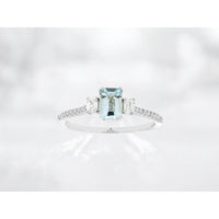 14K White Gold Three-Stone Ring with Emerald-Cut Aquamarine and Diamond Accents - 0.45 Carat Aquamarine and 0.28 Carat Total Diamond Weight - Royal Jewelry