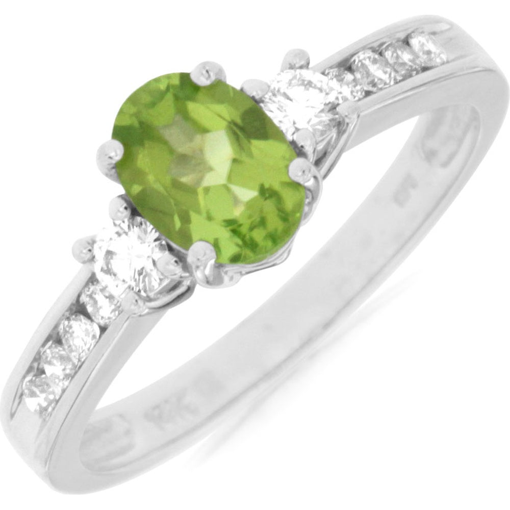 14K White Gold Three-Stone Ring with Oval Peridot and Diamond Side Stones - 0.85 Carat Peridot and 0.40 Carat Total Diamond Weight - Royal Jewelry