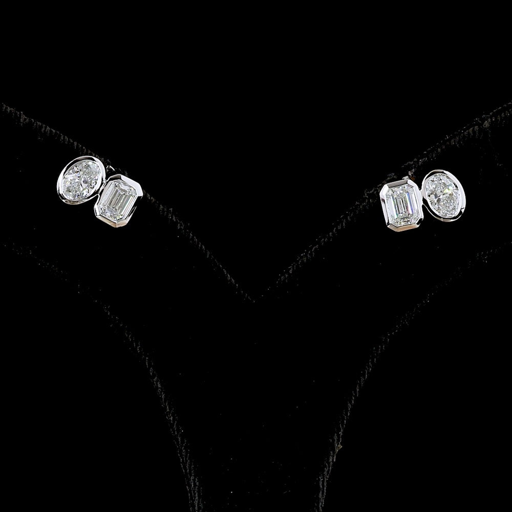14K White Gold Toi et Moi Earrings with Bezel Set Emerald Cut and Oval Cut Lab Diamonds - 1.94 Carat Total Weight (E-F VS2) - Covaloro Fine Jewelry