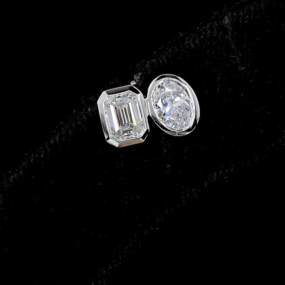 14K White Gold Toi et Moi Earrings with Bezel Set Emerald Cut and Oval Cut Lab Diamonds - 1.94 Carat Total Weight (E-F VS2) - Covaloro Fine Jewelry