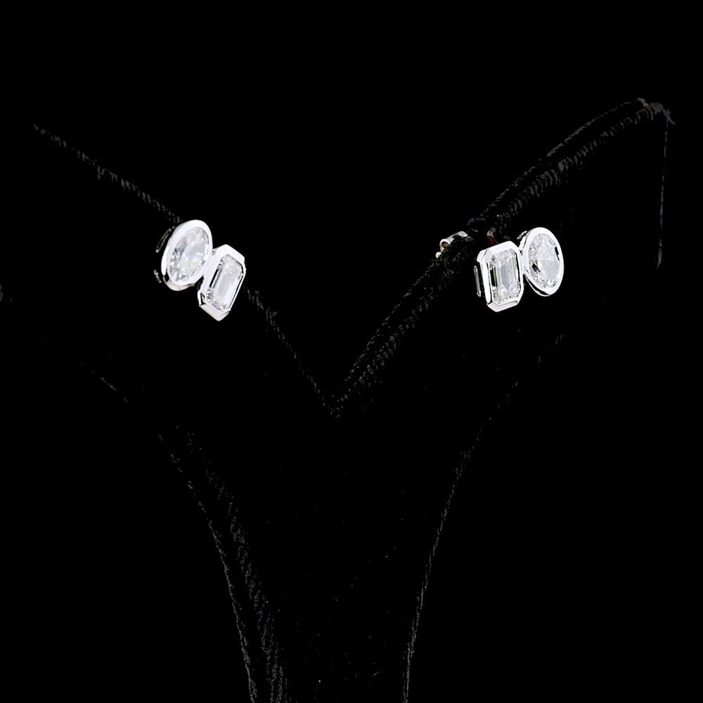 14K White Gold Toi et Moi Earrings with Bezel Set Emerald Cut and Oval Cut Lab Diamonds - 1.94 Carat Total Weight (E-F VS2) - Covaloro Fine Jewelry