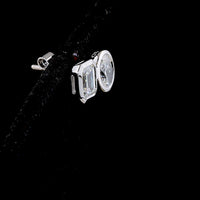 14K White Gold Toi et Moi Earrings with Bezel Set Emerald Cut and Oval Cut Lab Diamonds - 1.94 Carat Total Weight (E-F VS2) - Covaloro Fine Jewelry