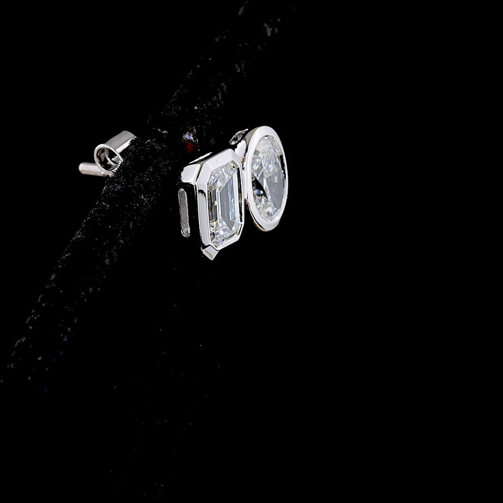 14K White Gold Toi et Moi Earrings with Bezel Set Emerald Cut and Oval Cut Lab Diamonds - 1.94 Carat Total Weight (E-F VS2) - Covaloro Fine Jewelry
