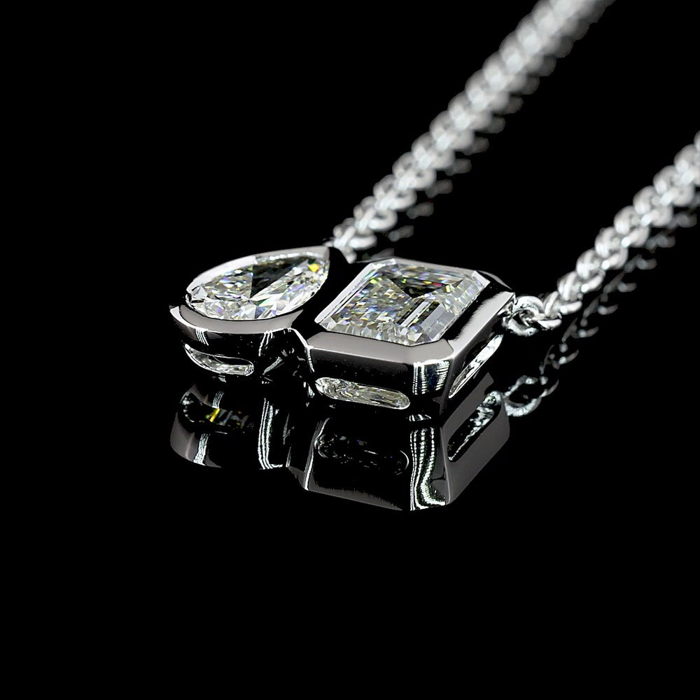 14K White Gold Toi et Moi Pendant with 1.10 Carat Emerald Cut and 0.48 Carat Pear Shape Lab Diamonds - 1.58 Carat Total Weight in Bezel Setting - Covaloro Fine Jewelry