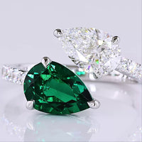 14K White Gold Toi et Moi Ring with Pear Shape Lab Emerald and E VS1 Lab Diamond - 1.60 Carats Total Gem Weight with 0.50 Carats Accent Diamonds - Covaloro Fine Jewelry