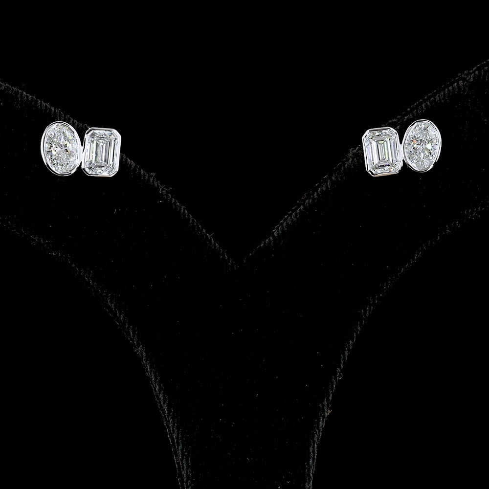 14K White Gold Toi et Moi Stud Earrings with Bezel Set Emerald Cut and Oval Cut Lab Diamonds - 2.05 Carat Total Diamond Weight - Covaloro Fine Jewelry
