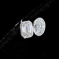14K White Gold Toi et Moi Stud Earrings with Bezel Set Emerald Cut and Oval Cut Lab Diamonds - 2.05 Carat Total Diamond Weight - Covaloro Fine Jewelry