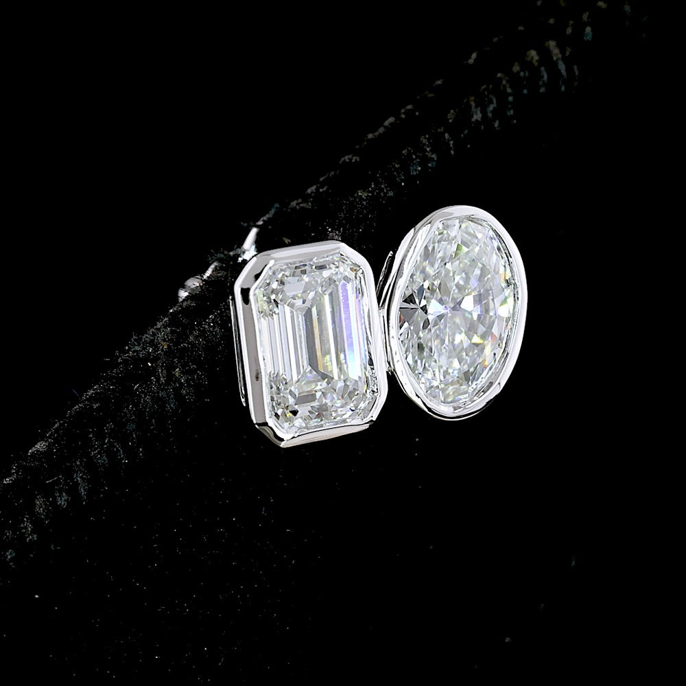 14K White Gold Toi et Moi Stud Earrings with Bezel Set Emerald Cut and Oval Cut Lab Diamonds - 2.05 Carat Total Diamond Weight - Covaloro Fine Jewelry