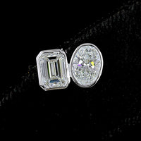 14K White Gold Toi et Moi Stud Earrings with Bezel Set Emerald Cut and Oval Cut Lab Diamonds - 2.05 Carat Total Diamond Weight - Covaloro Fine Jewelry