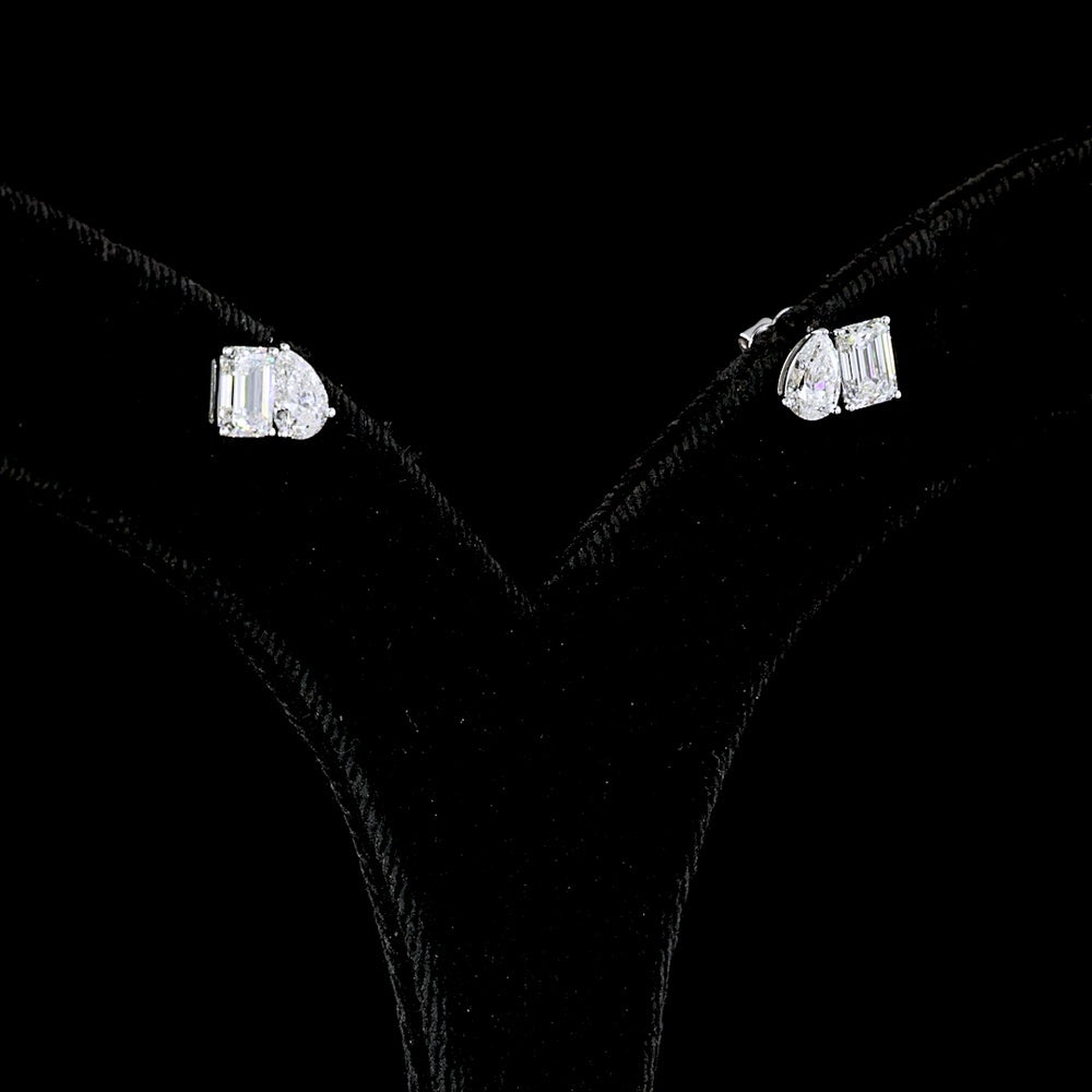 14K White Gold Toi et Moi Stud Earrings with Emerald Cut and Pear Cut Lab Grown CVD Diamonds - 1.77 Carats Total Diamond Weight - Covaloro Fine Jewelry