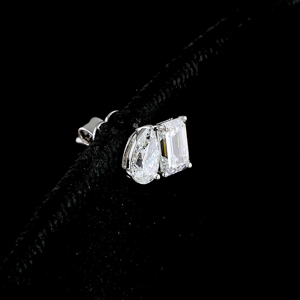 14K White Gold Toi et Moi Stud Earrings with Emerald Cut and Pear Cut Lab Grown CVD Diamonds - 1.77 Carats Total Diamond Weight - Covaloro Fine Jewelry