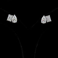 14K White Gold Toi et Moi Stud Earrings with Pear and Radiant Cut Lab Diamonds - 6.07 Total Carat Weight, E Color, VS1-VVS2 Clarity - Covaloro Fine Jewelry