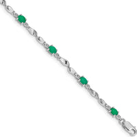 14K White Gold Twisted Link Bracelet with Oval Emeralds and Round Diamonds - 0.22 Carats Total Emerald Weight, 0.01 Carats Total Diamond Weight by Monteluci Fine Jewelry