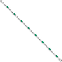 14K White Gold Twisted Link Bracelet with Oval Emeralds and Round Diamonds - 0.22 Carats Total Emerald Weight, 0.01 Carats Total Diamond Weight by Monteluci Fine Jewelry