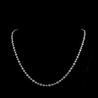 14K Yellow Gold 17" Station Line Tennis Necklace with 94 Round Lab Grown Diamonds - 13.83 Carat Total Weight, featuring E-F VS1 Brilliant Cut Stones in Prong and Bezel Black Rhodium Settings - Covaloro Fine Jewelry