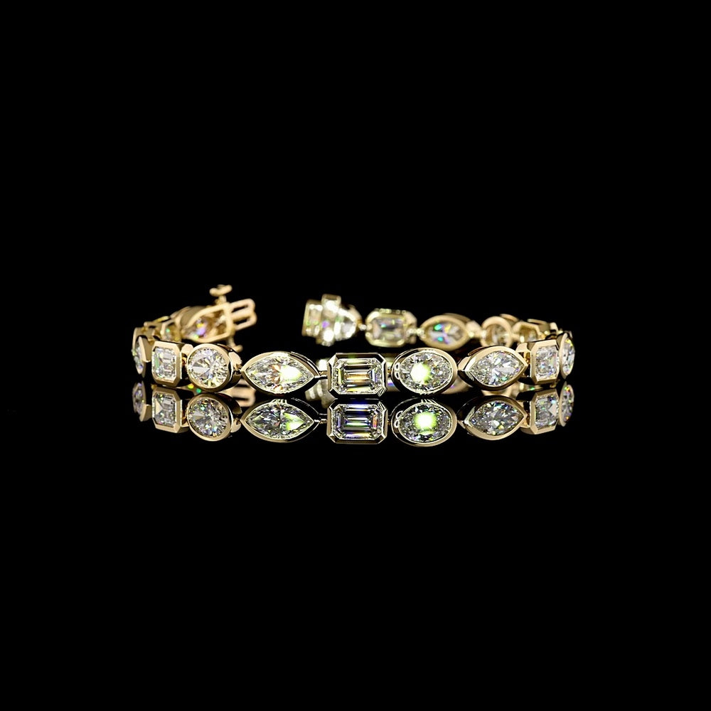 14K Yellow Gold 18-Stone Tennis Bracelet with Bezel Set Emerald, Oval, and Marquise Lab Diamonds - 15.44 Carat Total Weight - Covaloro Fine Jewelry