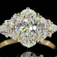 14K Yellow Gold 2.53 Carat Oval Cut Lab Diamond Special Ring with Marquise and Pear Shaped Side Stones - IGI Certified E-F Color VVS2 Clarity - Covaloro Fine Jewelry