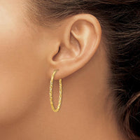 14K Yellow Gold 2mm Diamond-Cut Oval Hoop Earrings - Polished Finish by Oro Pregiato