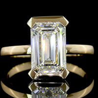 14K Yellow Gold 3.03 Carat Emerald Cut Solitaire Ring with Half Bezel Setting and North-South Orientation - Lab Grown F VVS2 Diamond IGI Certified - Covaloro Fine Jewelry