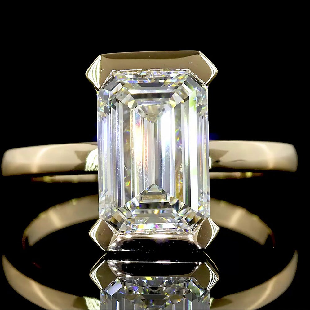 14K Yellow Gold 3.03 Carat Emerald Cut Solitaire Ring with Half Bezel Setting and North-South Orientation - Lab Grown F VVS2 Diamond IGI Certified - Covaloro Fine Jewelry
