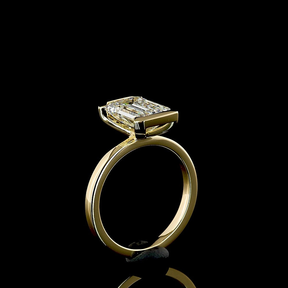 14K Yellow Gold 3.03 Carat Emerald Cut Solitaire Ring with Half Bezel Setting and North-South Orientation - Lab Grown F VVS2 Diamond IGI Certified - Covaloro Fine Jewelry