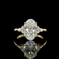 14K Yellow Gold 3.35 Carats Total Weight Oval Cut Lab Diamond Ring with E VVS2 Clarity and Marquise & Round Side Stones - IGI Certified - Covaloro Fine Jewelry
