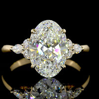 14K Yellow Gold 3.35 Carats Total Weight Oval Cut Lab Diamond Ring with E VVS2 Clarity and Marquise & Round Side Stones - IGI Certified - Covaloro Fine Jewelry