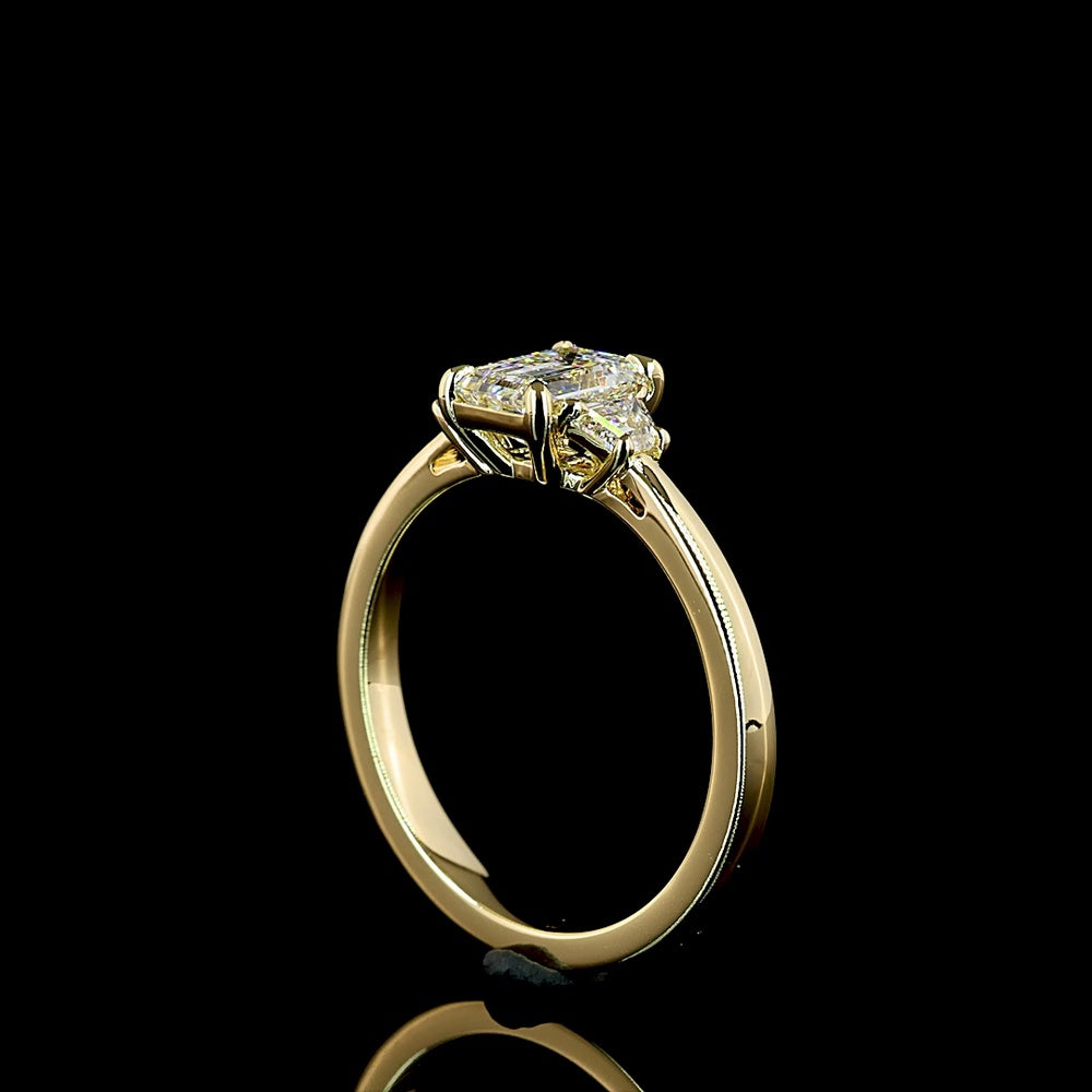 14K Yellow Gold 3-Stone Emerald Cut Lab Diamond Ring with Trapezoid Side Stones - 1.26 Carat Total Weight (E VVS2 Center) - Covaloro Fine Jewelry