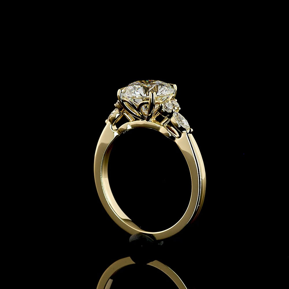 14K Yellow Gold 3-Stone Ring with 2.51 Carats Round Brilliant Cut Lab Diamond, Marquise and Round Side Diamonds - 2.76 Carats Total Diamond Weight - Covaloro Fine Jewelry