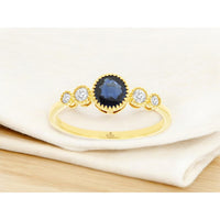 14K Yellow Gold 5-Stone Ring with 0.65 Carat Oval Sapphire and Graduated Round Diamonds - 0.12 Carat Total Diamond Weight - Royal Jewelry