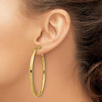 14K Yellow Gold 52mm Polished Round Hoop Earrings with Omega Clip Back Closure by Oro Pregiato