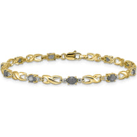 14K Yellow Gold 7.25" Bracelet with Oval Emeralds and Round Diamonds - 0.22 Carats Total Emerald Weight, 0.01 Carats Total Diamond Weight by Monteluci Fine Jewelry