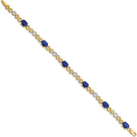 14K Yellow Gold 7.25" Tennis Bracelet with Oval Sapphires and Round Diamonds - 0.75 Carats Total Sapphire Weight, 0.21 Carats Total Diamond Weight by Monteluci Fine Jewelry