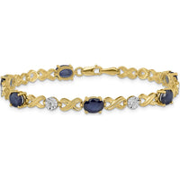 14K Yellow Gold 7.25" Tennis Bracelet with Oval Sapphires and Round Diamonds - 0.75 Carats Total Sapphire Weight, 0.21 Carats Total Diamond Weight by Monteluci Fine Jewelry