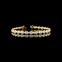 14K Yellow Gold 7.32 Carat Oval Cut Lab Diamond Tennis Bracelet with East-West Bezel Setting - 27 Stones, E-F VS1 Clarity - Covaloro Fine Jewelry