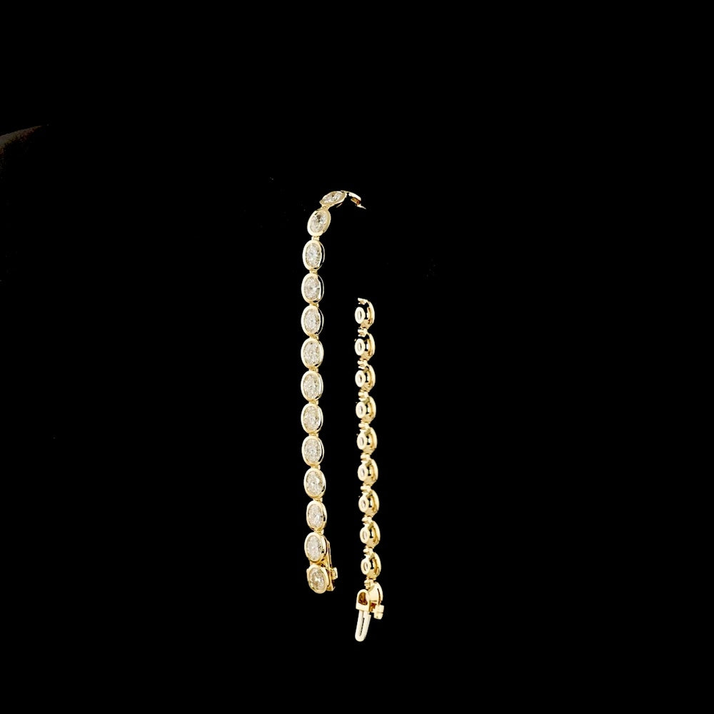 14K Yellow Gold 7.32 Carat Oval Cut Lab Diamond Tennis Bracelet with East-West Bezel Setting - 27 Stones, E-F VS1 Clarity - Covaloro Fine Jewelry