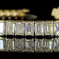 14K Yellow Gold 7.5-Inch Tennis Bracelet with 51 Half-Bezel Set Emerald Cut Lab Diamonds - 15.86 Carat Total Weight - Covaloro Fine Jewelry