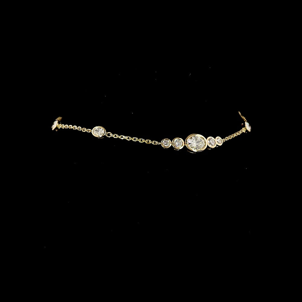 14K Yellow Gold 7.5" Station Bracelet with East-West Oval and Round Bezel Set Lab Diamonds - 0.99 Carat Total Diamond Weight - Covaloro Fine Jewelry