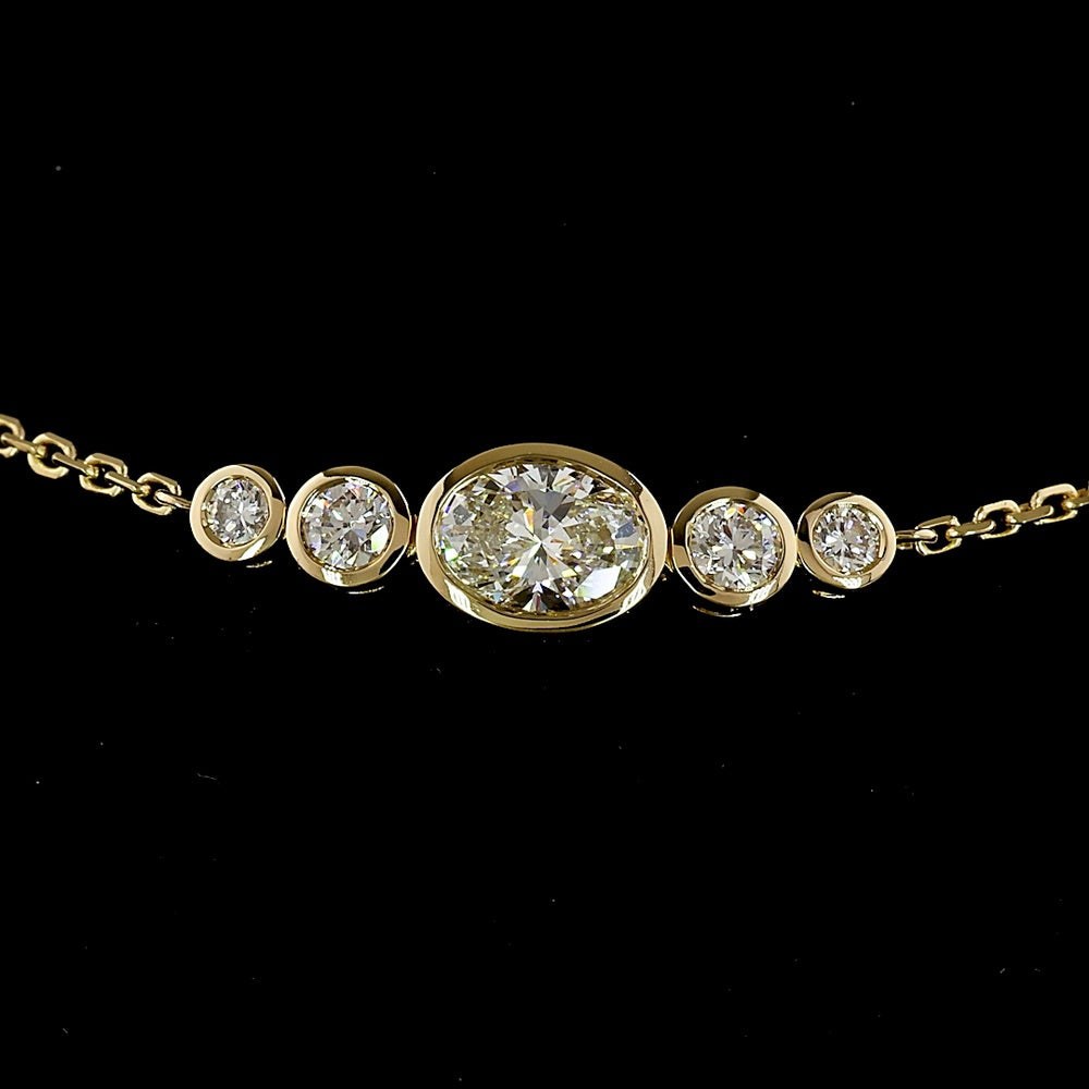 14K Yellow Gold 7.5" Station Bracelet with East-West Oval and Round Bezel Set Lab Diamonds - 0.99 Carat Total Diamond Weight - Covaloro Fine Jewelry