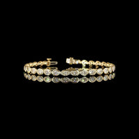 14K Yellow Gold 7.5" Tennis Bracelet with East-West Bezel Set Oval Cut Lab Diamonds (E-F VS1) - 5.40 Carat Total Diamond Weight - Covaloro Fine Jewelry