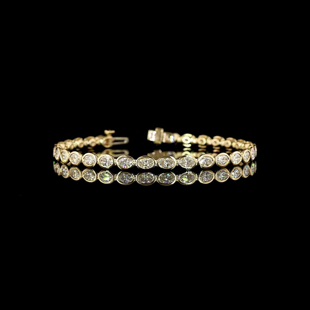 14K Yellow Gold 7.5" Tennis Bracelet with East-West Bezel Set Oval Cut Lab Diamonds (E-F VS1) - 5.40 Carat Total Diamond Weight - Covaloro Fine Jewelry