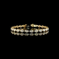 14K Yellow Gold 7.5" Tennis Bracelet with East-West Bezel Set Pear Shaped Lab Diamonds - 7.08 Carat Total Weight, E-F VS Clarity - Covaloro Fine Jewelry