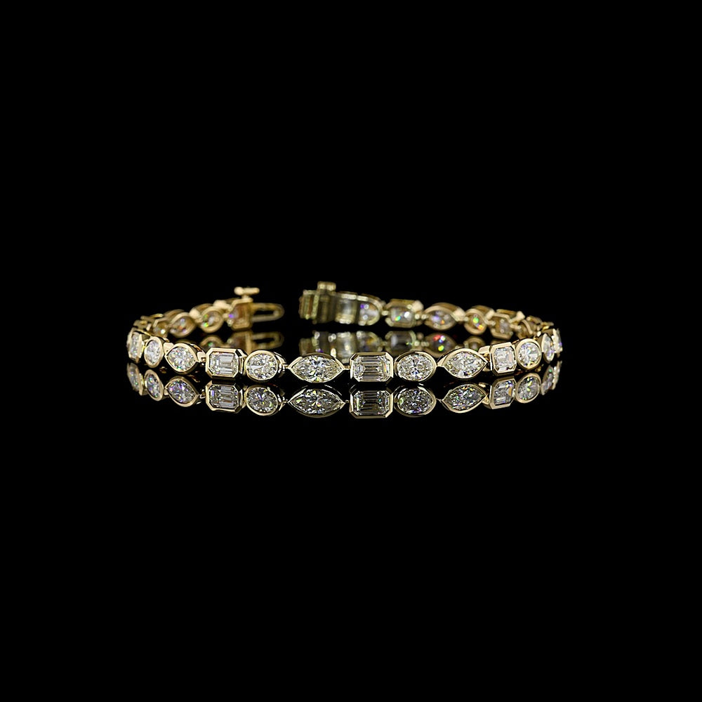 14K Yellow Gold 7.72 Carat Mixed Shape Tennis Bracelet with East-West Bezel Set Emerald, Marquise, and Oval Lab Diamonds - E-F VS1 Clarity - Covaloro Fine Jewelry