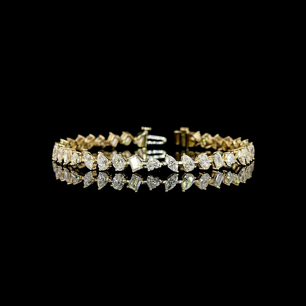14K Yellow Gold 7.75" Mixed Shape Station Bracelet with Prong-Set Emerald, Oval, Heart, and Pear Cut Lab Diamonds - 7.54 Carat Total Weight - Covaloro Fine Jewelry