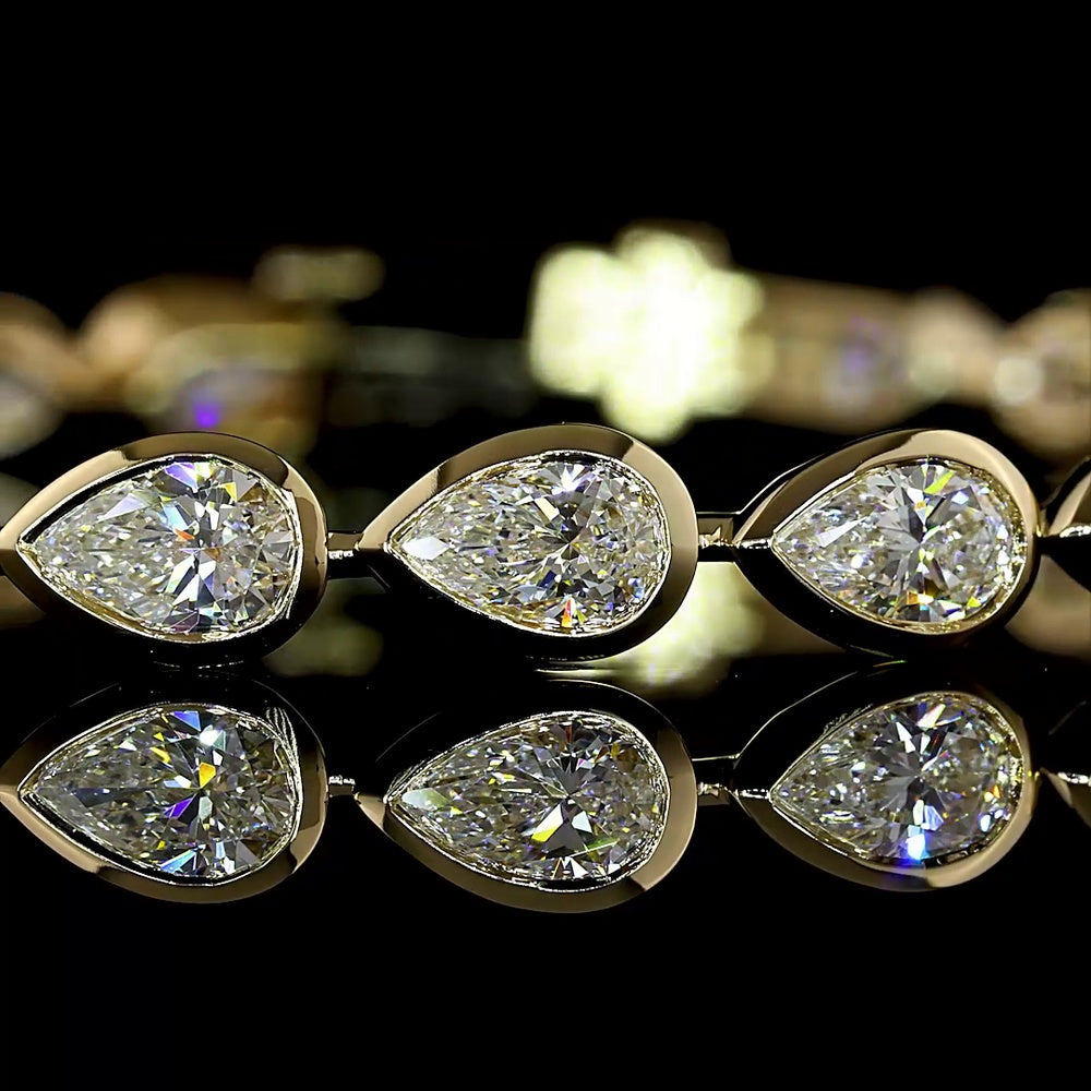 14K Yellow Gold 7.98 Carat Tennis Bracelet with East-West Bezel Set Pear Shaped Lab Diamonds - 24 Stones, E-F Color VS Clarity - Covaloro Fine Jewelry