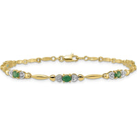 14K Yellow Gold 7" Bracelet with Oval Emerald Heart Design and Round Diamonds - 0.22 Carats Total Emerald Weight, 0.01 Carats Total Diamond Weight by Monteluci Fine Jewelry