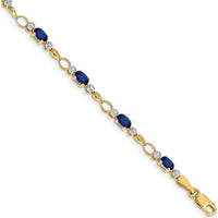 14K Yellow Gold 7" Bracelet with Oval Sapphires and Round Diamonds - 0.30 Carats Total Sapphire Weight, 0.01 Carats Total Diamond Weight by Monteluci Fine Jewelry