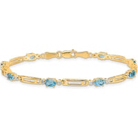 14K Yellow Gold 7" Bracelet with Oval Swiss Blue Topaz and Round Diamonds - 0.30 Carats Total Swiss Blue Topaz, 0.005 Carats Total Diamond Weight by Oro Pregiato
